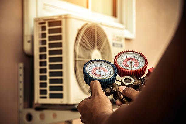 Professional Ac Installation technician working in Columbiana, AL